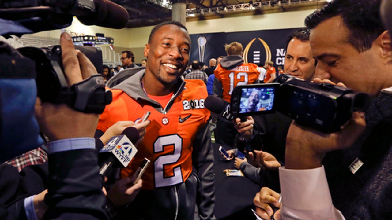 THE LATEST: 50th matchup of AP No. 1 vs. No. 2 set to start